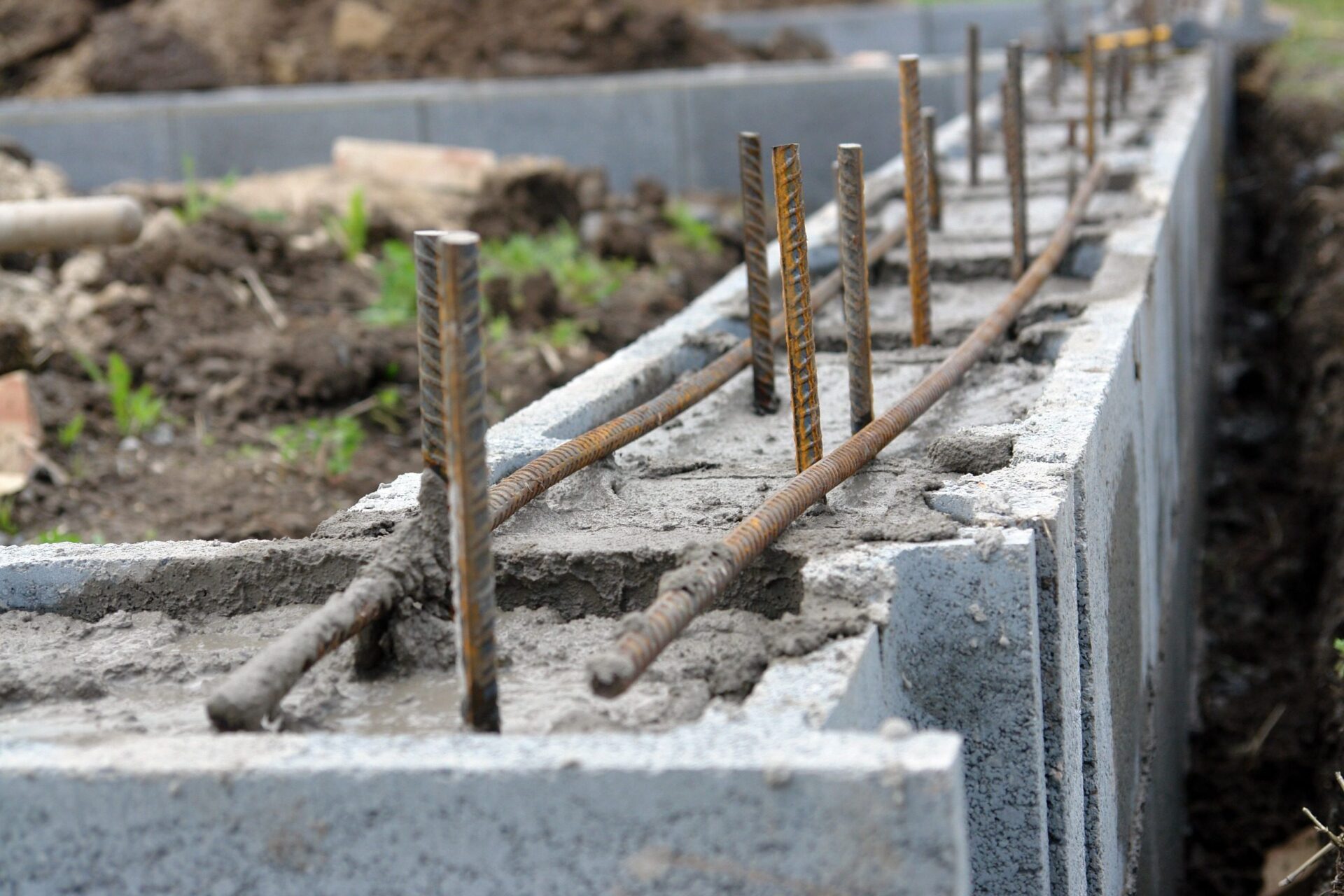 Closeup of house foundation made from concrete shuttering blocks Closeup of house foundation made from concrete shuttering blocks