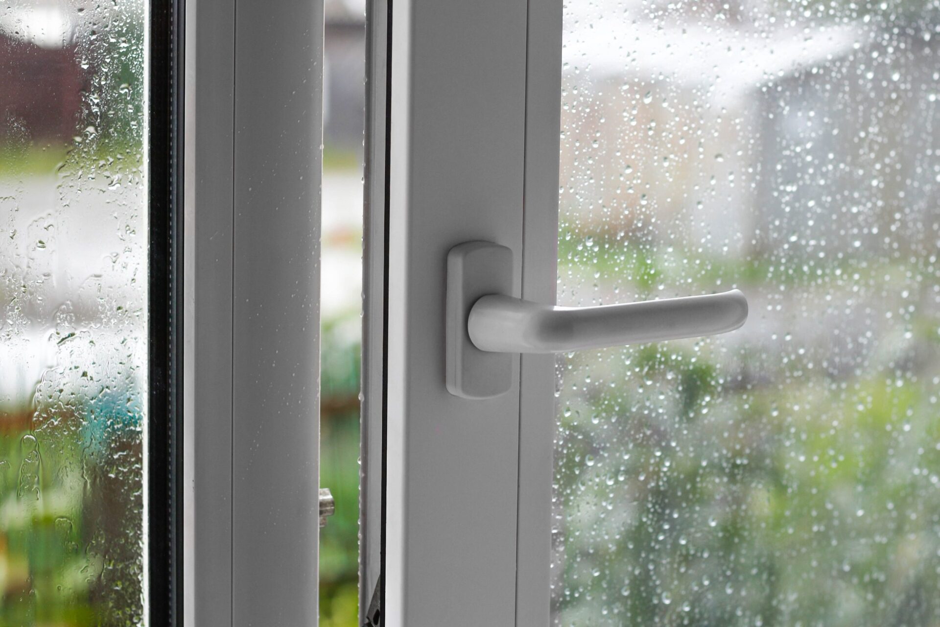 Rain drops on the white window Rain drops on the white window